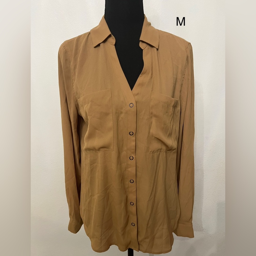 Tan color longe sleeve button blouse size M.